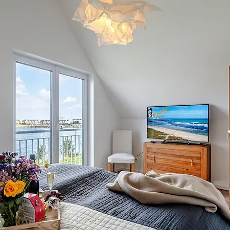 Дом отдыха Ferienhaus-an-der-ostsee-by-seeblick-ferien-oro-direkte-wasserlage-sauna-e-saeule *